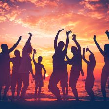 Young Adult Summer Beach Party Dancing Concept Young Adult Summer Beach Party Dancing Concept